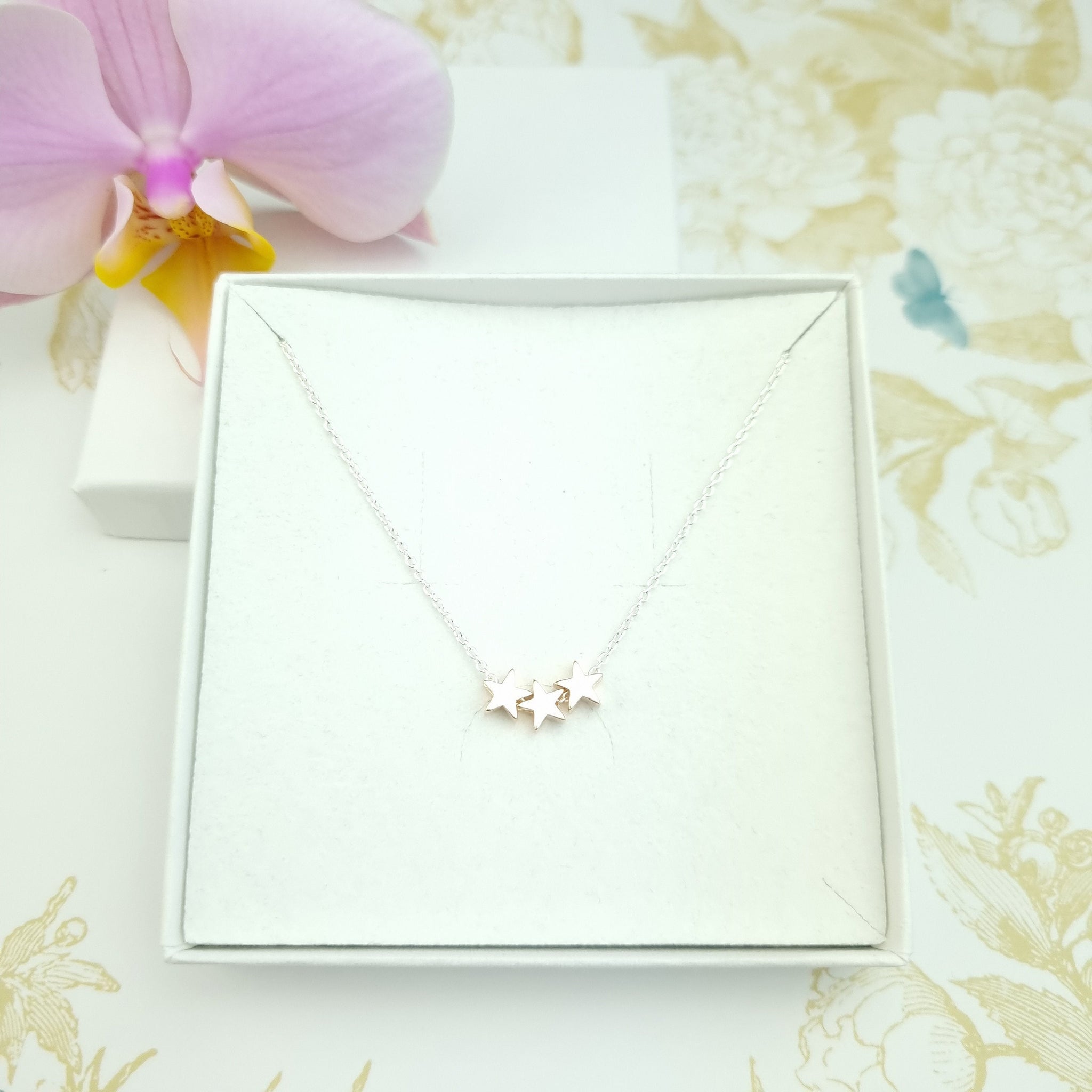 sterling silver and rose gold vermeil triple star necklace