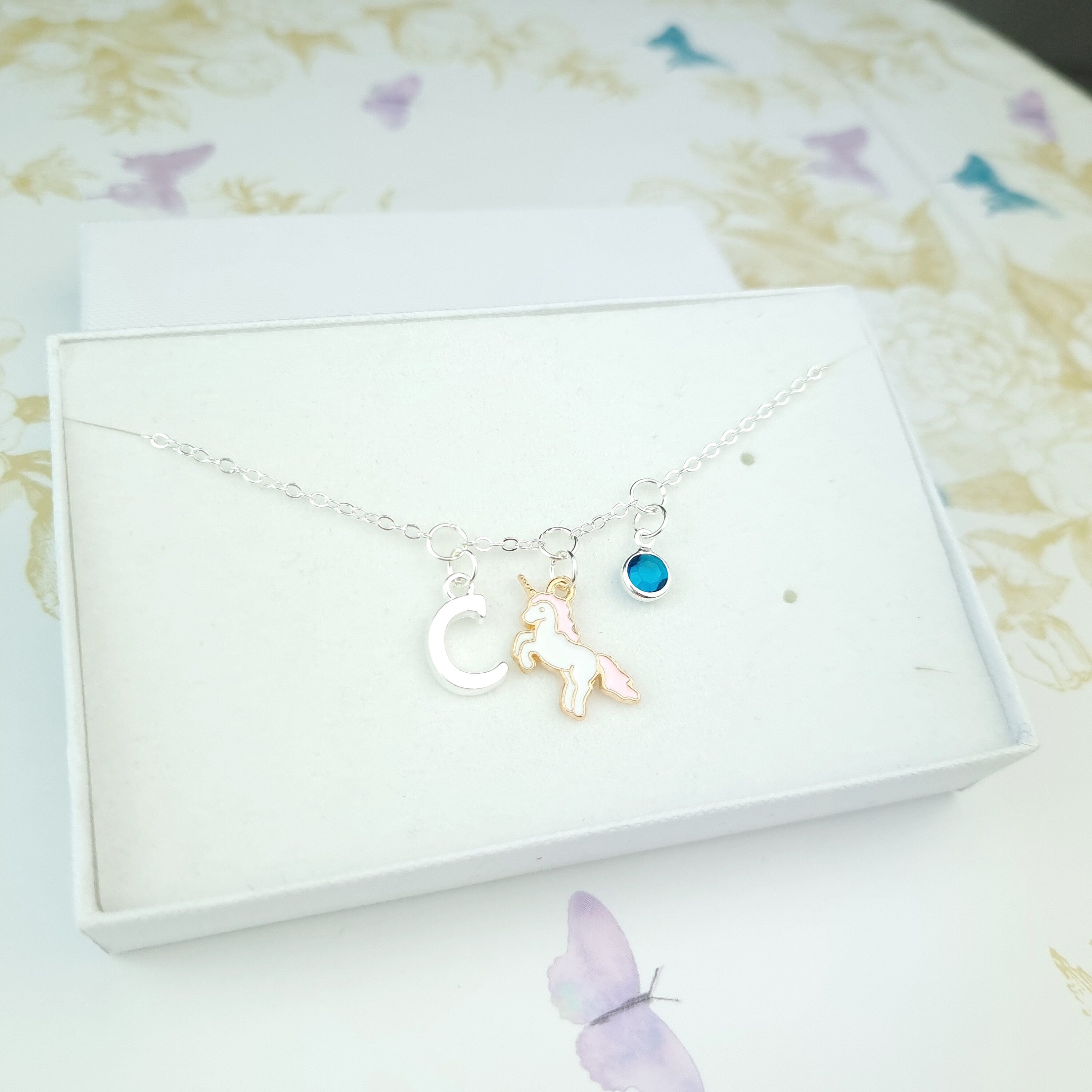 unicorn bracelet with initial and birthstone in silver